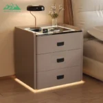 Modern smart nightstand with digital lock, Bluetooth speaker, and wireless charging pad - 3-drawer bedside table in bedroom setting