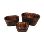 Brown wooden garden planter set with three planters arranged on a patio