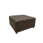 Goldoma modern black square storage ottoman with button tufting and wooden legs in a living room setting