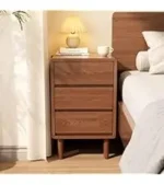 Mid-century solid walnut nightstand with drawer in bedroom setting