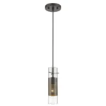 HMS pendant light illuminated in warm white 3000K, casting a cozy glow over a living room seating area with beige sofa