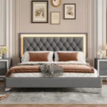 Queen bed frame with charging ports featuring an adjustable velvet wingback headboard in a modern bedroom