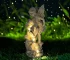 Solar fairy statue glowing in a garden at dusk