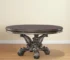 Gray solid pine wood round dining table 60 inch with pedestal base in a dining room setting
