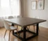 Solid wood dining table in dark brown finish with black iron legs, square shape, 60 inches, set in a modern dining room