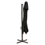Black polyester cantilever patio umbrella stand in garden setting