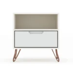 White nightstand with drawer and open shelf in a minimalist bedroom setting