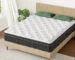 Goldoma Hybrid Mattress in a Box unboxed on a bed frame showing memory foam and pocket spring layers
