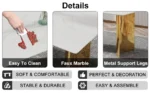 Modern square stone dining table with white marble glass top and gold metal legs in a contemporary dining room