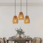 7-inch rustic hemp rope pendant light with three lights, hanging over a farmhouse dining table, natural rope texture