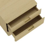 Natural oak nightstand with 3 drawers in a modern bedroom setting