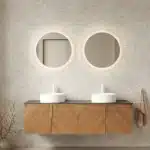 Goldoma 60-inch floating bathroom vanity with two white ceramic sinks, plywood cabinet in a modern bathroom setting,
