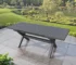 Modern aluminum rectangular outdoor table in grey finish with chairs on patio