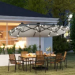 Gray cantilever offset patio umbrella providing shade over outdoor dining set