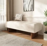 Goldoma modern tufted linen bench with solid wood legs and button tufting in a living room setting