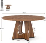 Modern round dining table with marble top and wood legs seating six in a living room