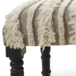 Goldoma 47-inch cream boho stripe upholstered bench with black metal legs in a living room setting