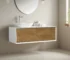 Modern 48-inch wall-mounted single sink bathroom vanity in white with a sleek countertop and chrome faucet, set against