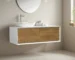 Modern 48-inch wall-mounted single sink bathroom vanity in white with a sleek countertop and chrome faucet, set against
