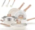 Goldoma non toxic cookware set with 12 pieces pots and pans on a kitchen counter