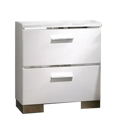 Glam white nightstand with chrome handles and high gloss lacquer finish, featuring two drawers, placed beside a bed in a modern bedroom.