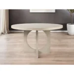 54 inch rounded dining table set with sintered stone top and natural wood pedestal base in a modern dining room setting