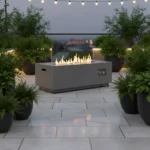 Goldoma 50k BTU fire pit with natural gas flames on a patio