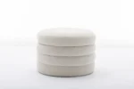 Goldoma fabric storage ottoman in living room with hidden storage compartment open