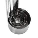 Stainless steel measuring cup with hook hanging on a kitchen rack
