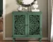 Vintage mango wood accent cabinet with symmetrical floral carved doors in rustic style