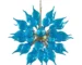 Modern blown glass chandelier in a contemporary living room setting