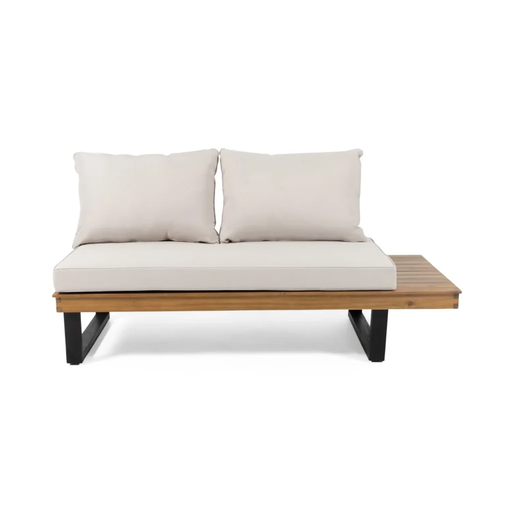 Beige cushioned outdoor sofa set with acacia wood frame and black metal legs on patio