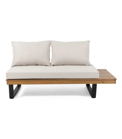 Beige cushioned outdoor sofa set with acacia wood frame and black metal legs on patio