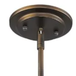 Bronze metal hanging light in a minimalist living room, complementing modern decor with its warm white illumination.