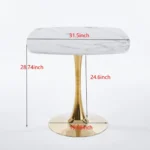 Modern square dining table with marble top and gold metal base in a small apartment dining room