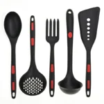 Premium silicone kitchen utensil set with spatulas, pliers, and spoons on a countertop