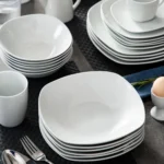 Elegant 50-piece porcelain tableware set by MALACASA Elisa series on a dining table