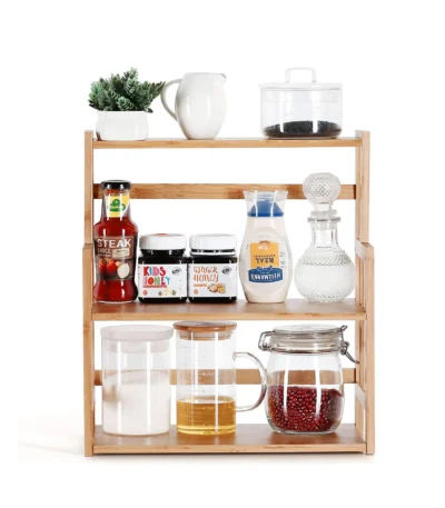 3-tier bamboo spice rack on kitchen countertop with jars neatly arranged