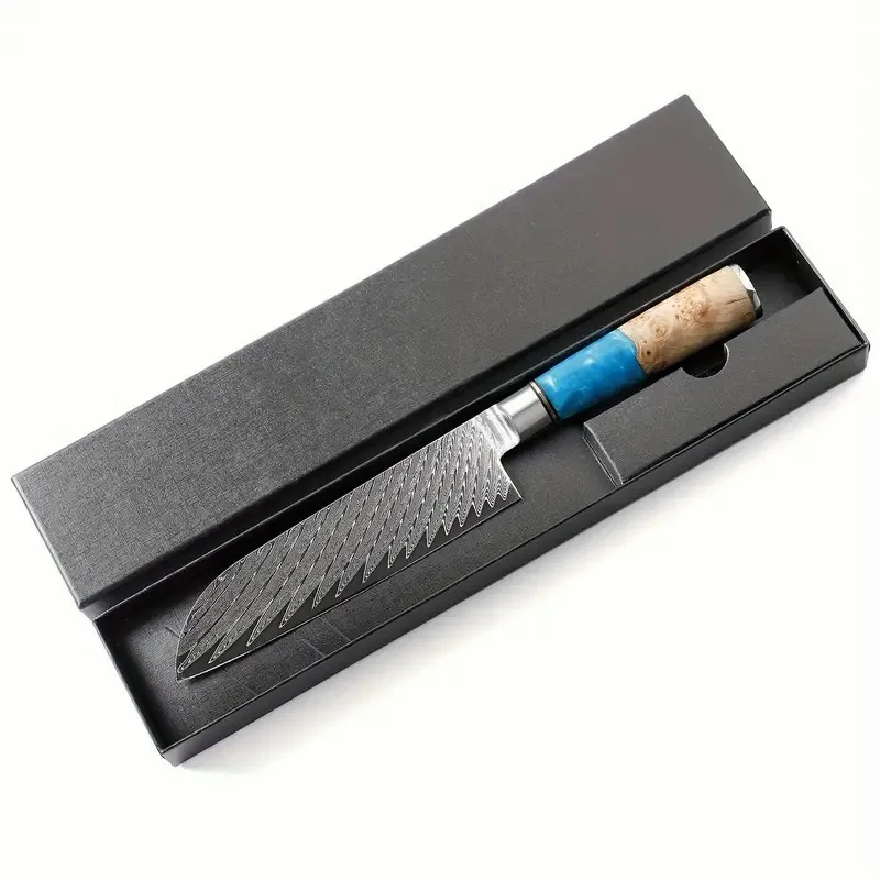 Japanese chef knife with Damascus steel blade and burlwood handle on cutting board