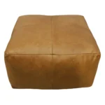 Goldoma 22 inch tan genuine leather pouf ottoman as a footrest