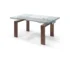 63-inch self storing leaf table with clear and brown glass top in dining room