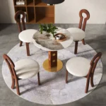 Modern sintered stone square dining table for 4 by Goldoma, white top with metal legs in dining room