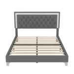 Queen bed frame with charging ports featuring an adjustable velvet wingback headboard in a modern bedroom