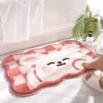 Non slip bathroom rug with frog and bear flocking design on bathroom floor