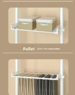 Freestanding coat rack with hooks holding jackets and bags in an entryway, adjustable design with sturdy steel frame