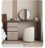 Minimalist wood dressing table with mirror and three storage drawers in modern bedroom setting