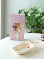 Cute fruit plate with Rilakkuma character in kawaii style on a ceramic plate with fruit slices
