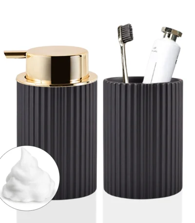 White foaming soap dispenser with farmhouse charm on a marble bathroom countertop.