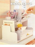 Girl cosmetics sorting student desktop mark pen drawer multi grid storage pen holder on a pink desk.