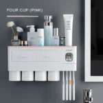 Close-up of the magnetic base, highlighting the strong magnet holding a toothbrush securely.